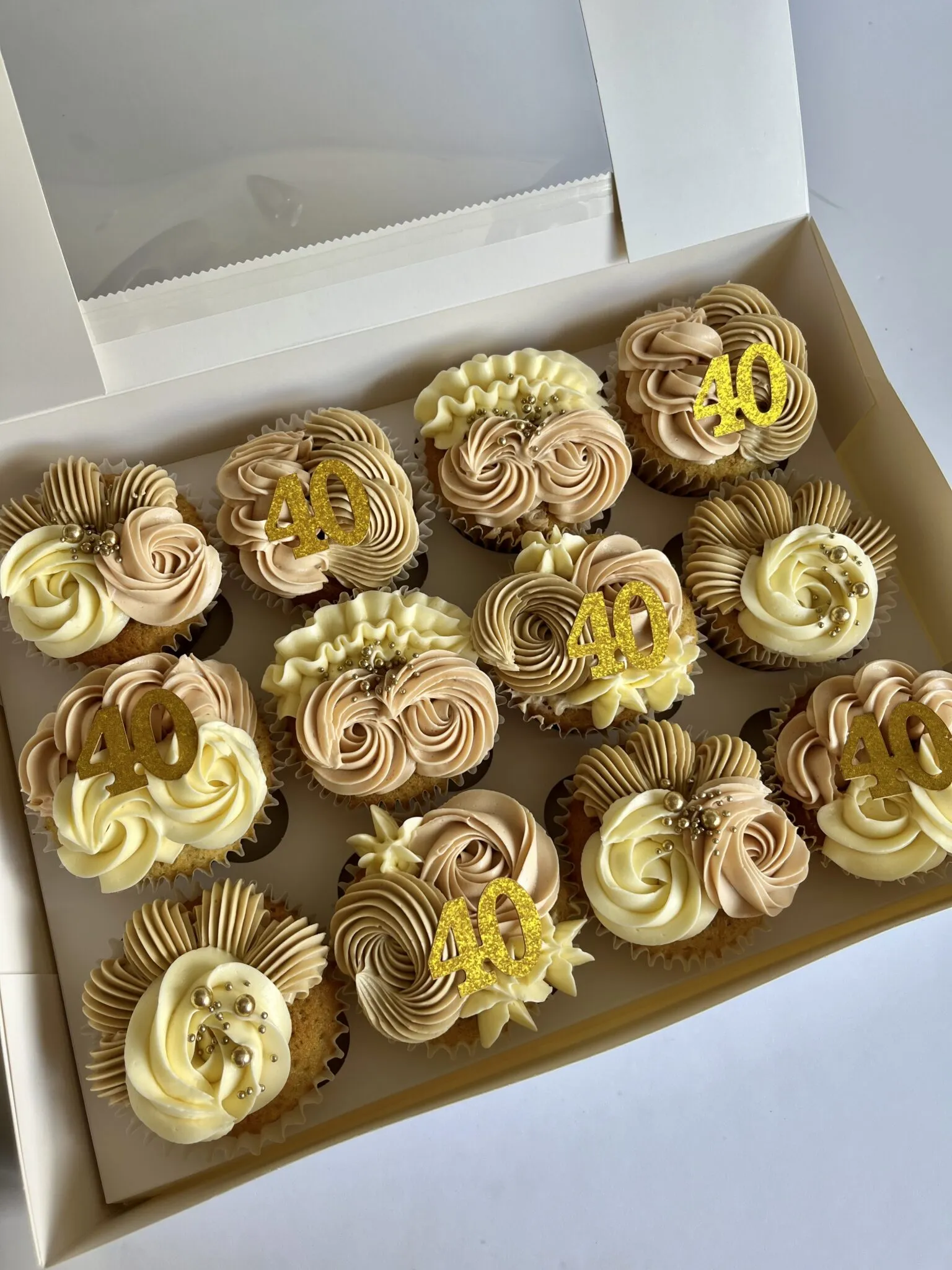 Beige and gold 40th cupcakes