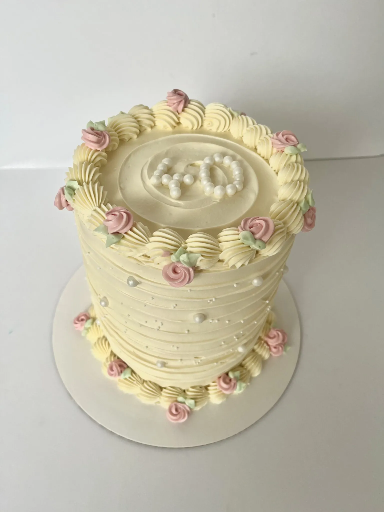 Pink and white floral 40th cake