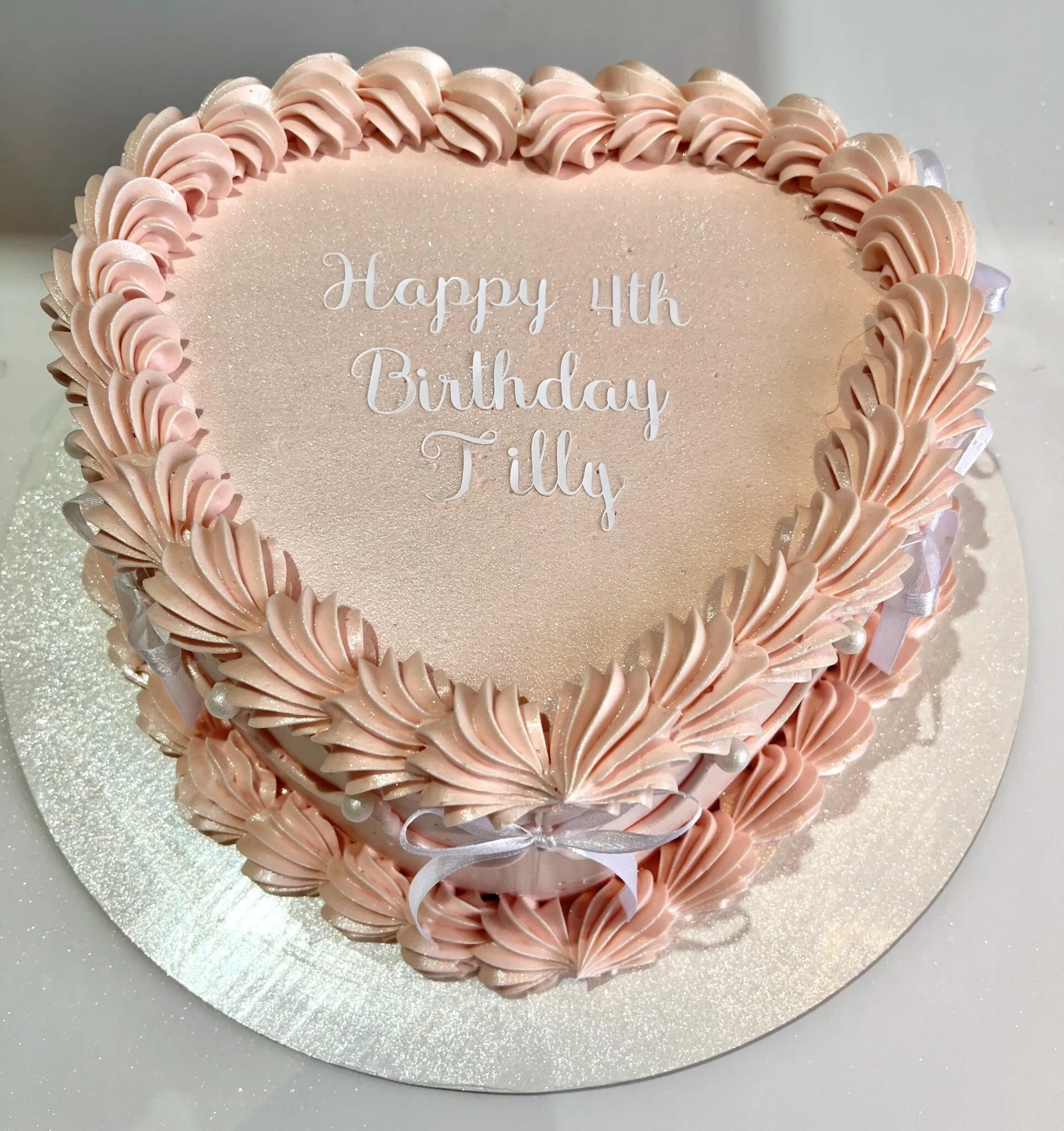 Pink 4th birthday heart cake