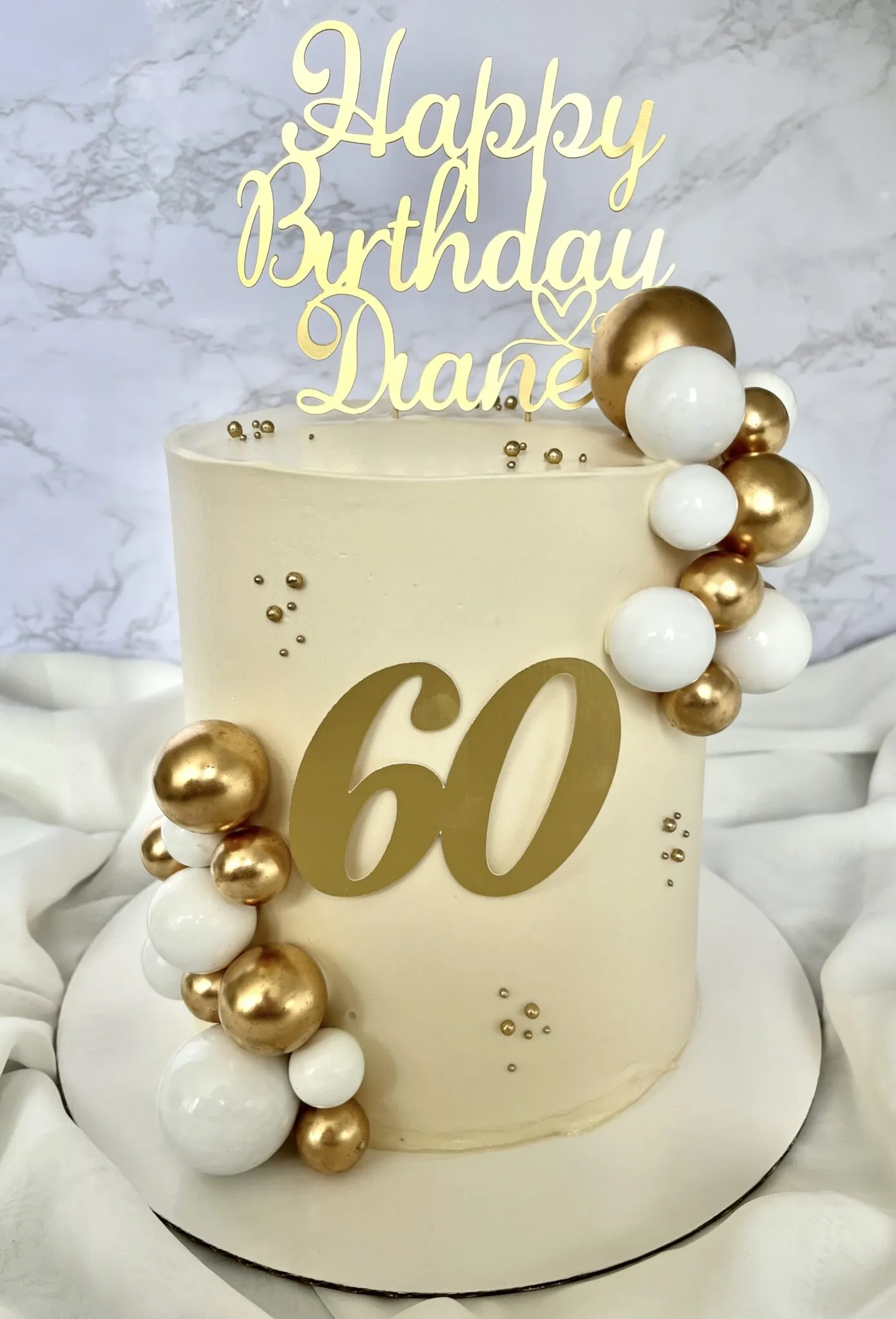 White and gold 60th cake