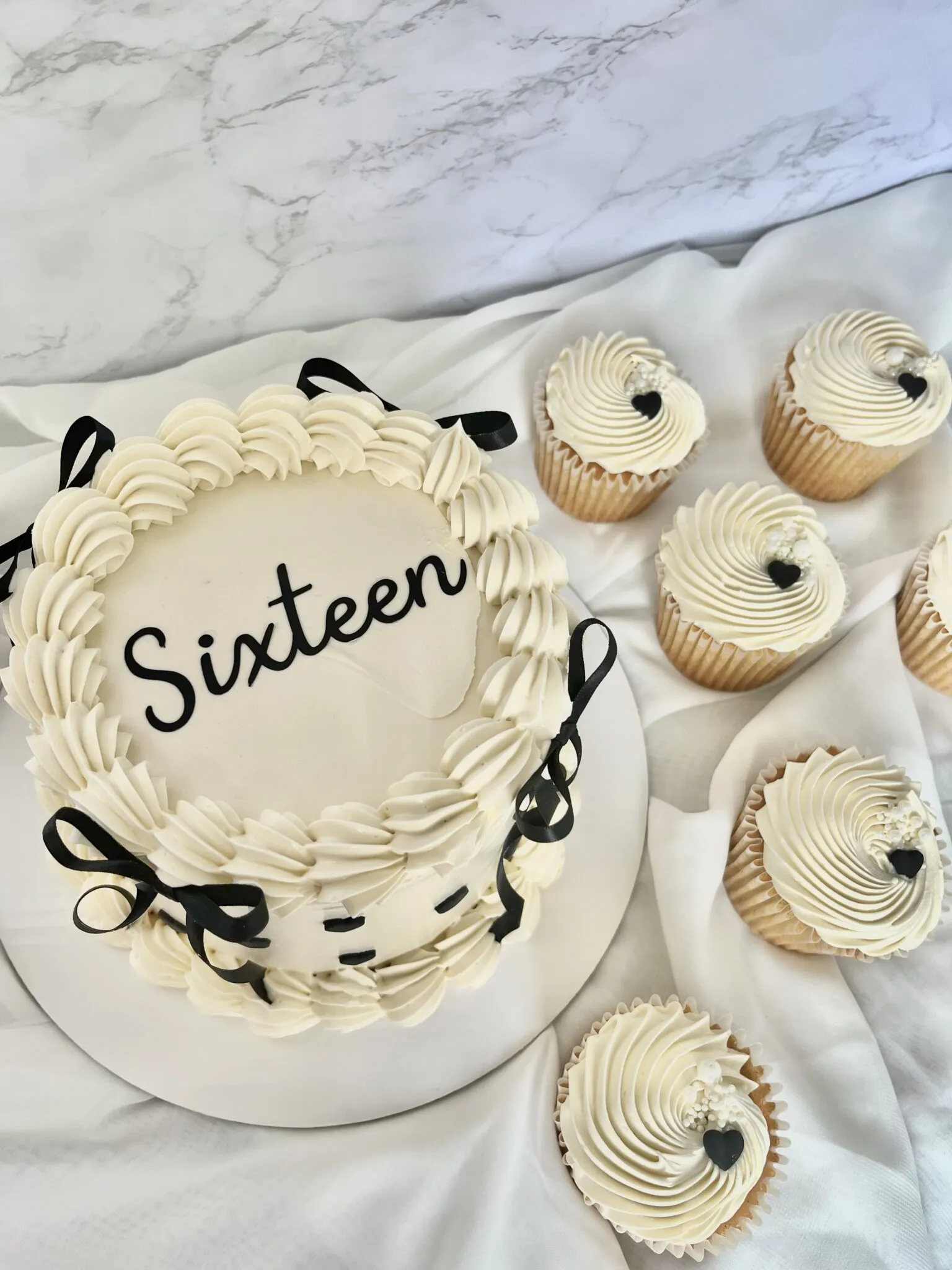 Sixteen cake & cupcakes